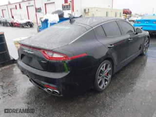 2018 Kia Stinger GT1 with VIN KNAE45LC4J6035780, listed as a IAAI auction lot 41560394 with 86,312 mi miles. Bid and sale history available at carsss.com. Image 4.