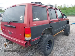 1999 Jeep Cherokee Sport with VIN 1J4FF68SXXL670160, listed as a IAAI auction lot 42265237 with 197,390 mi miles and . Bid and sale history available at DreamBid. Image 4.
