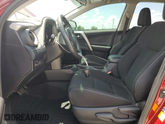 2018 Toyota RAV4 XLE with VIN 2T3WFREV7JW477541, listed as a Copart auction lot 64756575 with 59,779 mi miles and Salvage title. Bid and sale history available at DreamBid. Image 7.
