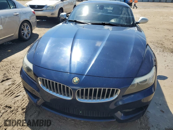 2011 BMW Z4 sDrive35is with VIN WBALM1C56BE393858, listed as a Copart auction lot 74249954 with Not provided miles and Salvage title. Bid and sale history available at DreamBid. Image 5.