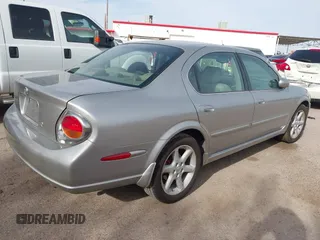 2002 Nissan Maxima GLE z VIN JN1DA31A22T302286, wystawiony jako IAAI lot #41929154 z przebiegiem 249 531 mil mil oraz . Historia ofert i sprzedaży dostępna na DreamBid. Obrazek 4.