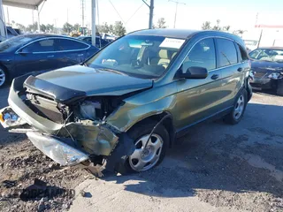 2007 Honda CR-V LX with VIN JHLRE38397C004598, listed as a IAAI auction lot 41301940 with 249,322 mi miles. Bid and sale history available at carsss.com. Image 17.