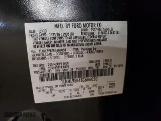 2014 Lincoln MKS with VIN 1LNHL9EK4EG606050, listed as a Copart auction lot 53412495 with 213,371 mi miles and Clean Title. Bid and sale history available at carsss.com. Image 12.