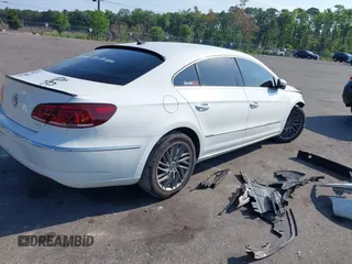 2015 Volkswagen CC R-Line with VIN WVWBN7AN3FE819870, listed as a IAAI auction lot 39390950 with 86,082 mi miles. Bid and sale history available at carsss.com. Image 4.