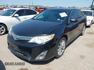 2014 Toyota Camry L with VIN 4T4BF1FK3ER413537, listed as a IAAI auction lot 42015577 with 181,592 mi miles. Bid and sale history available at carsss.com. Image 17.