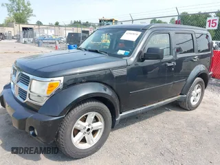 2008 Dodge Nitro SXT z VIN 1D8GU28K08W151127, wystawiony jako IAAI lot #42502070 z przebiegiem 145 972 mil mil oraz . Historia ofert i sprzedaży dostępna na DreamBid. Obrazek 2.