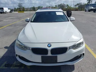 2015 BMW 4 Series 428i xDrive with VIN WBA4C9C56FG135520, listed as a IAAI auction lot 41574336 with 70,870 mi miles and . Bid and sale history available at carsss.com. Image 6.