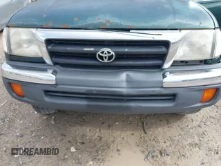 1999 Toyota Tacoma with VIN 4TAPM62N1XZ514312, listed as a IAAI auction lot 42168096 with Not Provided miles and . Bid and sale history available at DreamBid. Image 6.