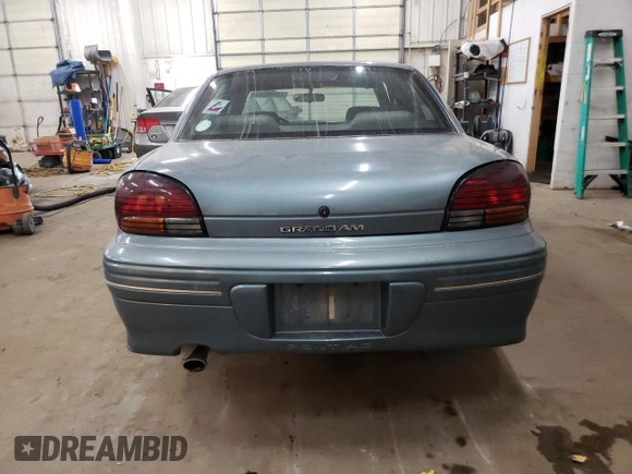1997 Pontiac Grand Am SE with VIN 1G2NE52M8VC721326, listed as a Copart auction lot 75860034 with 110,209 mi miles and Salvage title. Bid and sale history available at DreamBid. Image 6.