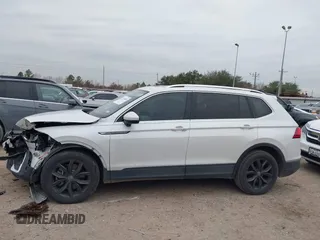 2023 Volkswagen Tiguan SE with VIN 3VVNB7AX8PM099759, listed as a IAAI auction lot 41340885 with 28,562 mi miles and . Bid and sale history available at DreamBid. Image 14.