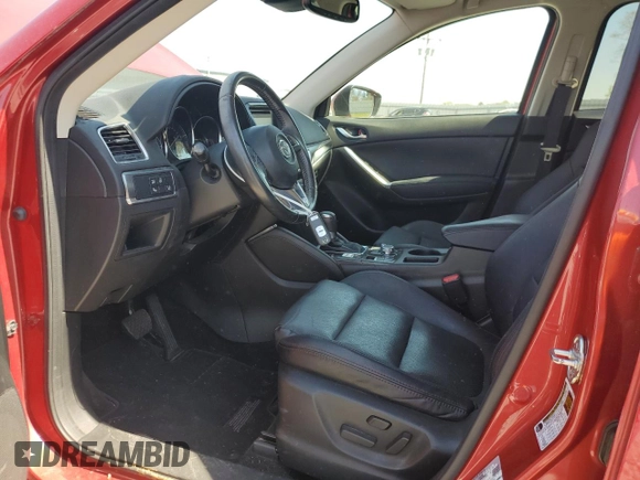 2016 Mazda CX-5 Grand Touring z VIN JM3KE2DYXG0840777, wystawiony jako Copart lot #49700585 z przebiegiem 116 469 mil mil oraz Szkoda całkowita • Salvage title. Historia ofert i sprzedaży dostępna na DreamBid. Obrazek 7.