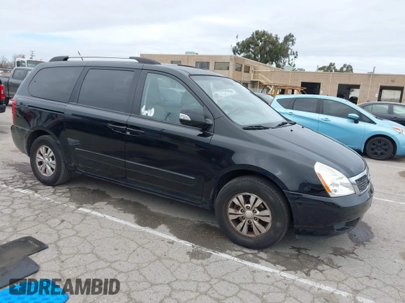 2012 Kia Sedona LX with VIN KNDMG4C78C6502141, listed as a IAAI auction lot 41725800 with 153,789 mi miles and . Bid and sale history available at carsss.com. Image 1.