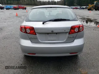2005 Suzuki Reno S z VIN KL5JD66Z95K217050, wystawiony jako Copart lot #86785194 z przebiegiem 77 614 mil mil oraz Szkody całkowita. Historia ofert i sprzedaży dostępna na DreamBid. Obrazek 6.