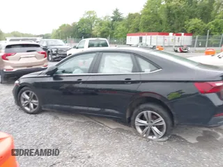 2023 Volkswagen Jetta SE z VIN 3VW7M7BUXPM061694, wystawiony jako IAAI lot #42231342 z przebiegiem 39 063 mil mil oraz . Historia ofert i sprzedaży dostępna na DreamBid. Obrazek 14.