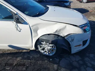 2012 Ford Fusion SEL with VIN 3FAHP0JAXCR305697, listed as a IAAI auction lot 41620691 with 264,270 mi miles. Bid and sale history available at carsss.com. Image 6.