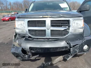 2011 Dodge Nitro SE with VIN 1D4PU2GK0BW541350, listed as a IAAI auction lot 41653467 with 207,940 mi miles. Bid and sale history available at carsss.com. Image 6.