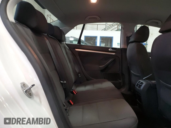 2010 Volkswagen Jetta S with VIN 3VWJZ7AJ5AM004163, listed as a Copart auction lot 54312695 with 148,160 mi miles and Salvage title. Bid and sale history available at DreamBid. Image 10.