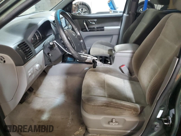 2007 Kia Sorento EX z VIN KNDJC736075707276, wystawiony jako Copart lot #56834855 z przebiegiem 160 544 mil mil oraz Szkoda całkowita • Salvage title. Historia ofert i sprzedaży dostępna na DreamBid. Obrazek 7.
