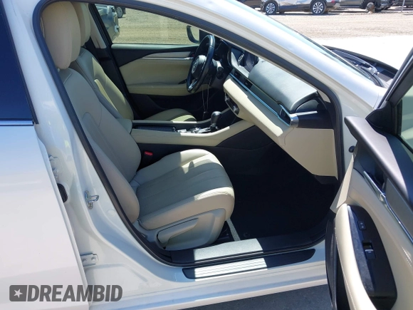 2021 Mazda 6 Touring with VIN JM1GL1VM4M1618686, listed as a IAAI auction lot 42079730 with 55,539 mi miles and . Bid and sale history available at DreamBid. Image 5.