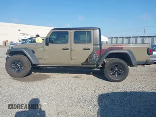 2020 Jeep Gladiator Sport S with VIN 1C6HJTAG0LL216406, listed as a IAAI auction lot 41991629 with 180,125 mi miles and . Bid and sale history available at DreamBid. Image 14.