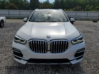 2019 BMW X5 xDrive40i with VIN 5UXCR6C5XKLK80703, listed as a Copart auction lot 63473495 with 57,260 mi miles and Salvage title. Bid and sale history available at DreamBid. Image 5.