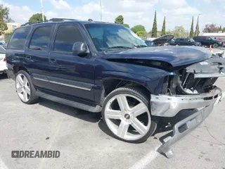 2005 Chevrolet Tahoe Z71 z VIN 1GNEC13T95R192599, wystawiony jako IAAI lot #41955397 z przebiegiem 179 292 mil mil oraz . Historia ofert i sprzedaży dostępna na DreamBid. Obrazek 1.