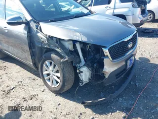 2017 Kia Sorento LX with VIN 5XYPGDA54HG306572, listed as a IAAI auction lot 42201527 with 74,815 mi miles and . Bid and sale history available at DreamBid. Image 6.