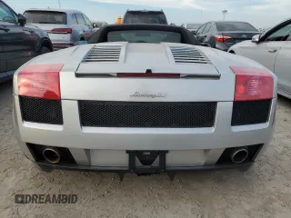 2007 Lamborghini Gallardo z VIN ZHWGU22T57LA05137, wystawiony jako Copart lot #76275354 z przebiegiem Nie podano mil oraz Szkody całkowita. Historia ofert i sprzedaży dostępna na DreamBid. Obrazek 6.