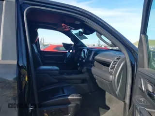 2023 Ram 1500 Limited with VIN 1C6SRFHT5PN542859, listed as a IAAI auction lot 41669646 with 80,045 mi miles and . Bid and sale history available at DreamBid. Image 5.