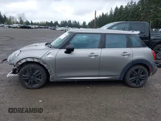 2017 MINI Hardtop 4 Door Cooper S z VIN WMWXU3C58H2D33073, wystawiony jako IAAI lot #41913081 z przebiegiem 51 631 mil mil oraz . Historia ofert i sprzedaży dostępna na DreamBid. Obrazek 15.