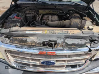 2003 Ford F-150 XL with VIN 2FTRX172X3CA58789, listed as a Copart auction lot 57986695 with 160,124 mi miles and Salvage title. Bid and sale history available at DreamBid. Image 11.