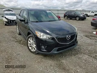 2014 Mazda CX-5 Grand Touring with VIN JM3KE4DY3E0304908, listed as a Copart auction lot 53873655 with 144,382 mi miles and Salvage Title. Bid and sale history available at DreamBid. Image 15.