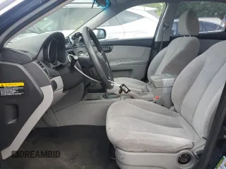 2010 Kia Optima LX z VIN KNAGG4A80A5398981, wystawiony jako Copart lot #59092515 z przebiegiem 153 524 mil mil oraz Szkoda całkowita • Salvage title. Historia ofert i sprzedaży dostępna na DreamBid. Obrazek 7.