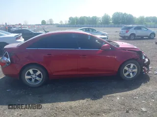 2014 Chevrolet Cruze 1LT z VIN 1G1PC5SB5E7127660, wystawiony jako IAAI lot #41955448 z przebiegiem 163 148 mil mil oraz . Historia ofert i sprzedaży dostępna na DreamBid. Obrazek 13.