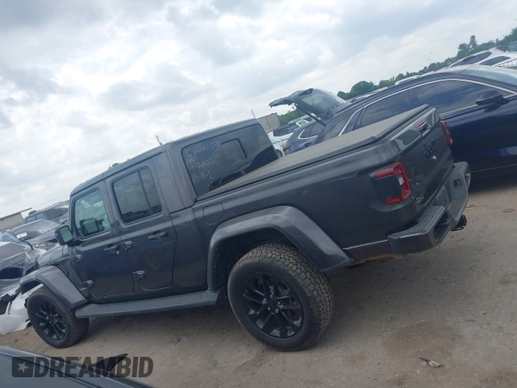 2021 Jeep Gladiator Overland with VIN 1C6HJTFG4ML617175, listed as a IAAI auction lot 42148031 with 70,627 mi miles and . Bid and sale history available at DreamBid. Image 14.