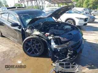 2023 Dodge Charger SXT z VIN 2C3CDXBG6PH598948, wystawiony jako IAAI lot #42171370 z przebiegiem 22 914 mil mil oraz . Historia ofert i sprzedaży dostępna na DreamBid. Obrazek 17.