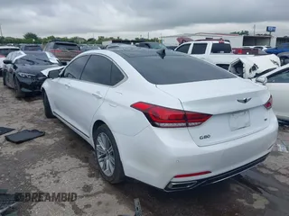2018 Genesis G80 3.8L z VIN KMHGN4JE2JU238178, wystawiony jako IAAI lot #42063099 z przebiegiem 78 569 mil mil oraz . Historia ofert i sprzedaży dostępna na DreamBid. Obrazek 3.