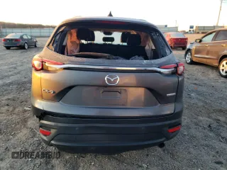 2020 Mazda CX-9 Touring с VIN JM3TCACY8L0414621, выставлен на аукционе Copart как лот 48508525 с пробегом Не указан миль и Списание • Salvage title. История ставок и продаж доступна на DreamBid. Изображение 6.