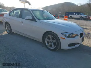 2014 BMW 3 Series 320i xDrive with VIN WBA3C3G52ENS72631, listed as a IAAI auction lot 41769487 with 61,006 mi miles. Bid and sale history available at carsss.com. Image 1.