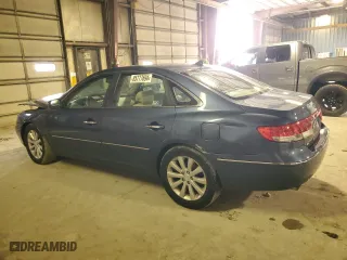2009 Hyundai Azera GLS with VIN KMHFC46D89A349297, listed as a Copart auction lot 85777694 with 103,647 mi miles and Salvage Title. Bid and sale history available at carsss.com. Image 2.