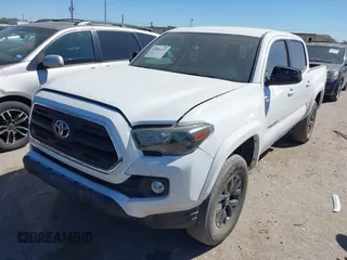2021 Toyota Tacoma SR with VIN 3TYAX5GN6MT016452, listed as a IAAI auction lot 41816457 with 30,617 mi miles and . Bid and sale history available at DreamBid. Image 17.