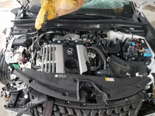 2024 Lexus UX 250h Premium z VIN JTHP6JBH0R2186659, wystawiony jako Copart lot #65626554 z przebiegiem 11 068 mil mil oraz Nie do naprawy • Non repairable. Historia ofert i sprzedaży dostępna na DreamBid. Obrazek 11.