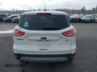 2013 Ford Escape SE with VIN 1FMCU9G93DUA17816, listed as a IAAI auction lot 41688140 with 129,738 mi miles. Bid and sale history available at carsss.com. Image 16.