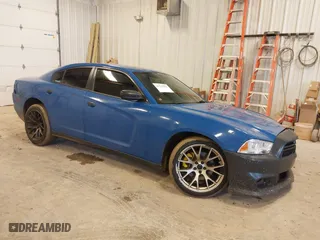 2014 Dodge Charger Police with VIN 2C3CDXAT5EH218901, listed as a IAAI auction lot 41723531 with 216,643 mi miles. Bid and sale history available at carsss.com. Image 1.
