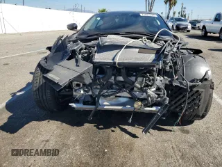 2018 Aston Martin DB11 z VIN SCFRMFAV1JGL05008, wystawiony jako Copart lot #77024394 z przebiegiem Nie podano mil oraz Szkody całkowita. Historia ofert i sprzedaży dostępna na DreamBid. Obrazek 5.