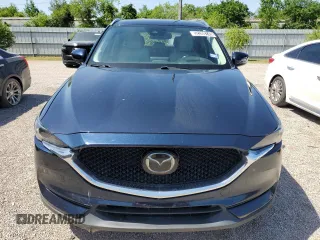 2018 Mazda CX-5 Grand Touring с VIN JM3KFBDM8J0344328, выставлен на аукционе Copart как лот 57665175 с пробегом 131 175 миль миль и Списание • Salvage title. История ставок и продаж доступна на DreamBid. Изображение 5.