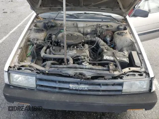 1987 Toyota Corolla с VIN JT2AE82E9H3531391, выставлен на аукционе Copart как лот 44657375 с пробегом 240 376 миль миль и Чистый • Clean title. История ставок и продаж доступна на DreamBid. Изображение 11.