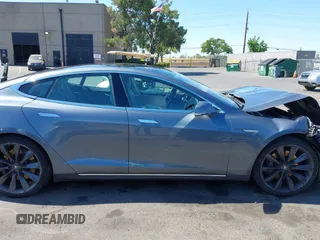 2014 Tesla Model S 60 with VIN 5YJSA1H19EFP36971, listed as a IAAI auction lot 42525811 with Not provided miles and . Bid and sale history available at DreamBid. Image 14.