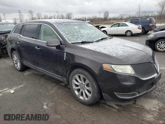 2014 Lincoln MKT with VIN 2LMHJ5FK9EBL50142, listed as a Copart auction lot 85564374 with 180,263 mi miles and Salvage Title. Bid and sale history available at DreamBid. Image 4.