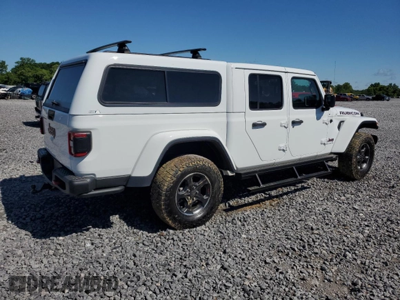 2023 Jeep Gladiator Rubicon with VIN 1C6JJTBG9PL546437, listed as a Copart auction lot 55516685 with 14,106 mi miles and Salvage title. Bid and sale history available at DreamBid. Image 3.